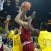 Michigan freshman Glenn Robinson III tries to block Indiana senior Christian Watford on Sunday, March 10. Daniel Brenner I AnnArbor.com